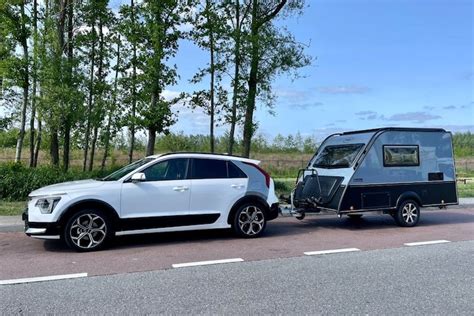 Kia Niro Trekt een Caravan